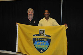 Councilman Stewart Cumbo and Mayor Bruce Wahl at MML Convention receiving second &ldquo;Banner City Award&rdquo; presented to the Town of Chesapeake Beach 